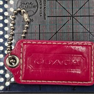 Coach Fuchsia Leather Tag